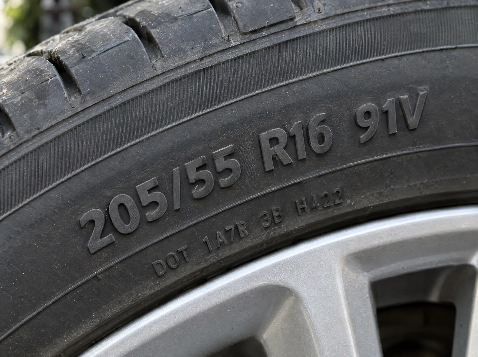 Tyre sidewall showing the size 205/55 R16 91V